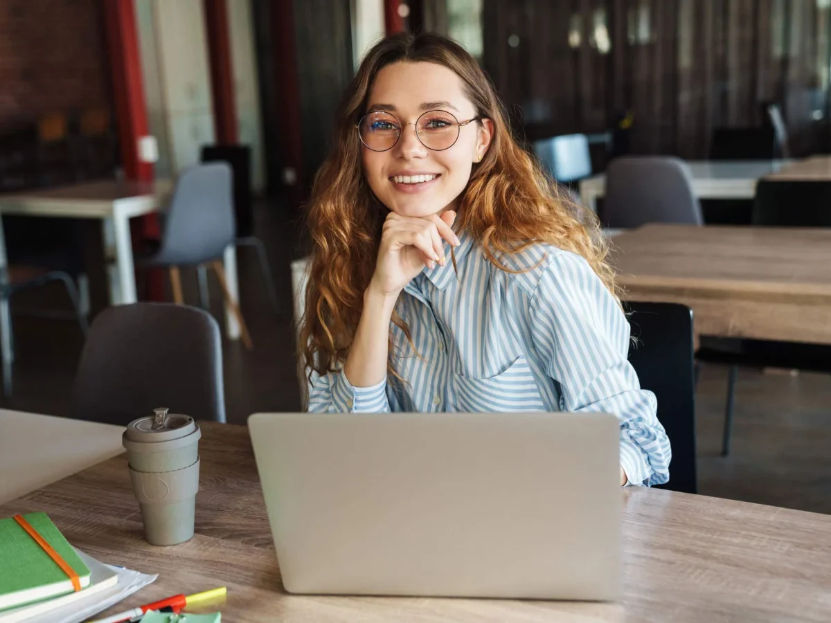 image-of-happy-beautiful-woman-using-laptop-and-sm-QNLF75B.jpg
